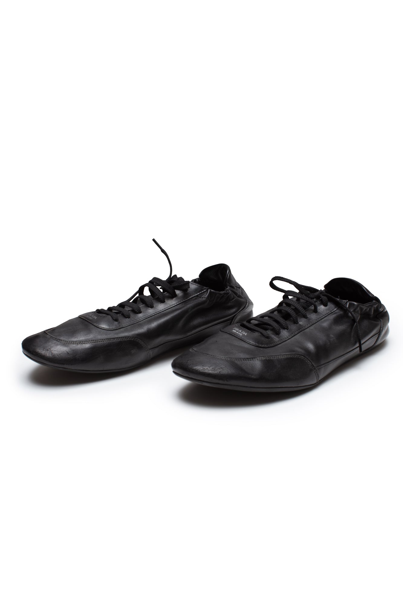 Prada Collapse Leather Sneakers - Xia Office